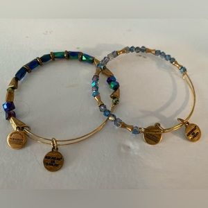 Alex & Ani two crystal bracelets.